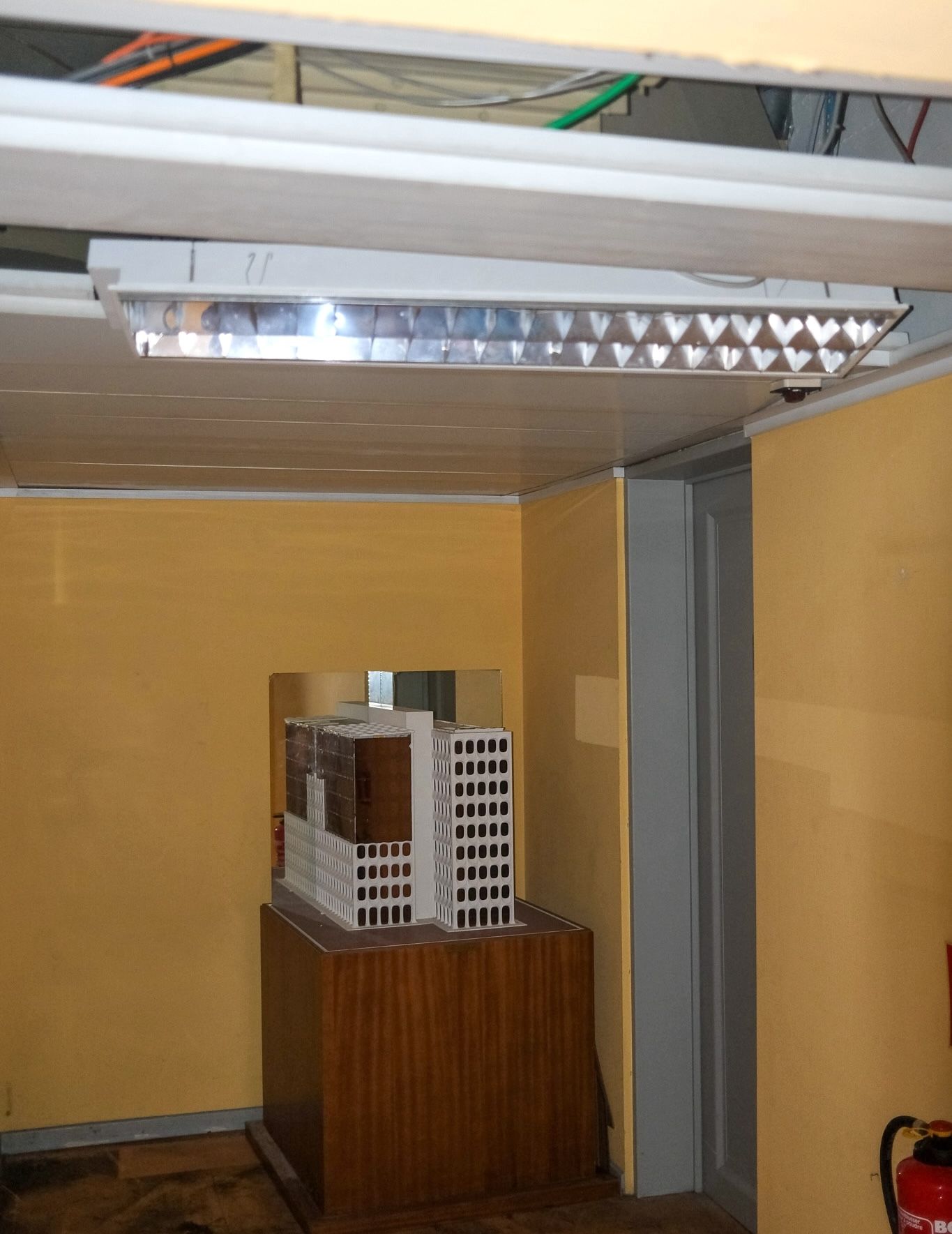 The receptionist directed me to this (broken) model in the basement from Belgium's sesquicentennial.